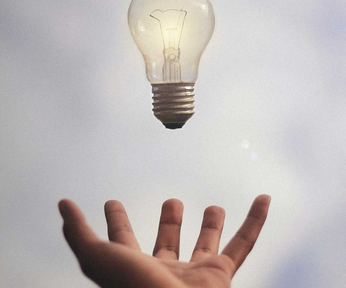 leadership development, boston ma: hand grabbing lightbulb